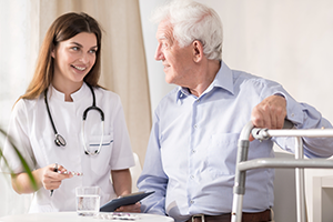 An image of a doctor speaking with a patient 