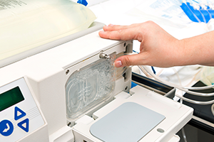 An image of someone working a medical machine